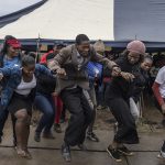 ESWATINI POLITICS PARLIAMENT OPPOSITION - Eswatini Holds Parliamentary Elections Amidst Political Challenges - Despite criticism of King Mswati's lavish lifestyle and poverty affecting nearly one-third of the population, the monarch remains entrenched in power. Criticizing the king can lead to imprisonment, and political challenges persist, as evidenced by the pro-democracy protests in 2021.