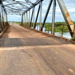 Before its construction in 1953, travelers had to cross the one-kilometer stretch of River Ssezibwa using canoes to transport their merchandise. This bridge was initially constructed to facilitate the transportation of cotton and coffee from Kayunga (Bugerere) to Kampala during the early 1940s to the 1970s.