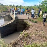 Watlac bridge as seen from near after it was washed by the heavy downpour in Ajan sub county, Pader district Photo Viga