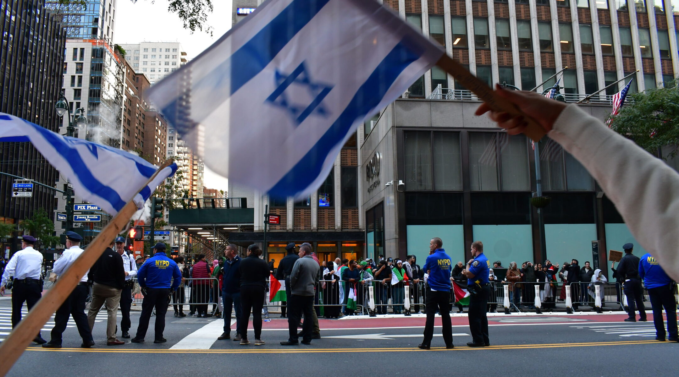 palestinian and israeli demonstrators face off in times square nyc