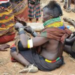 A Turkana woman covering her Jerrycan with skin in Lokiriama in Turkana last week (photo by Jonathan Opolot)