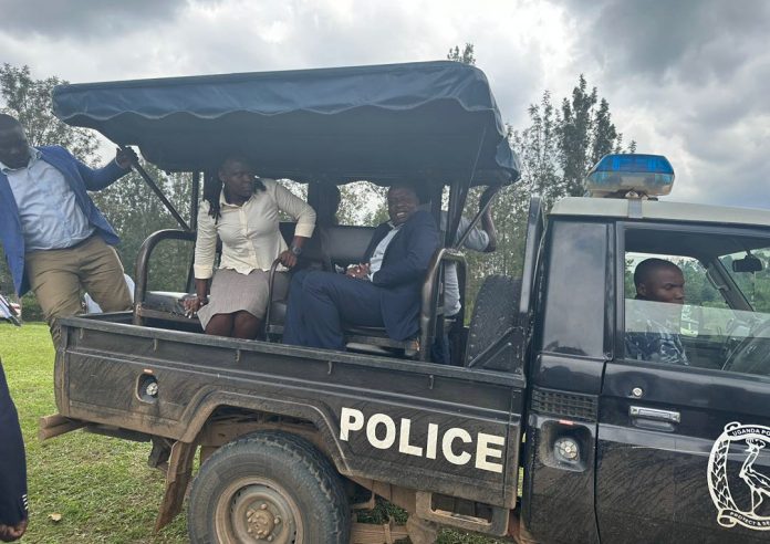 CORRUPTION KITAGWENDA CAO RICHARD SSEBANDEKE in navy blue suit AND 5 OTHER OFFICIALS ARRESTED 696x492