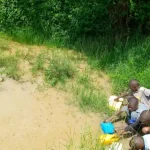 Children fetching water from unsafe water source in Myeba village in Masindi district Photo by Yosam Gucwaki