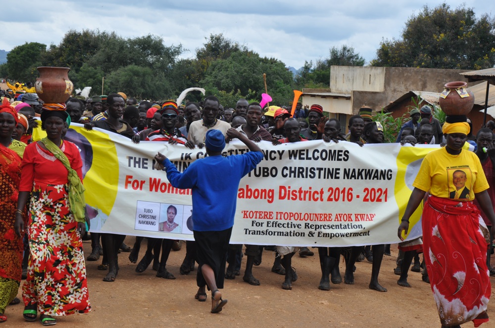 Christine Nakwang suppoters muching in Kaabong streets after her nomination on Monday (photo by Steven Ariong) (1)