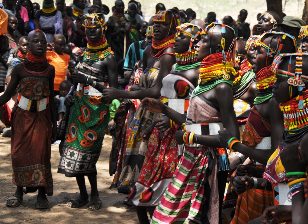 Turkana girls present a peace song during the cross border peace meeting in Namorupus in Loima Sub county Turkana County (photo by Steven Ariong)