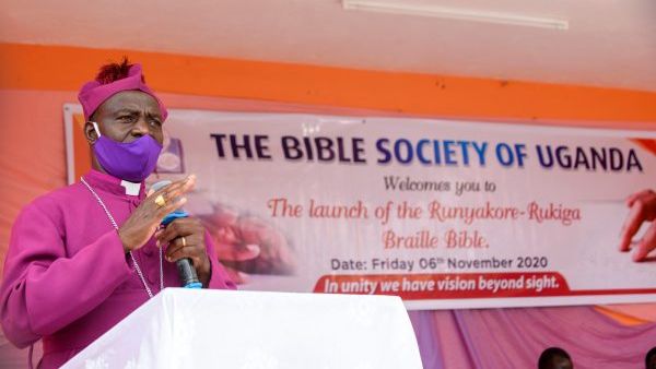 bible society of uganda donates braille bible and christmas gifts to visually impaired community