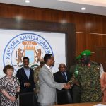 updf hands over security of vital sites to somali forces