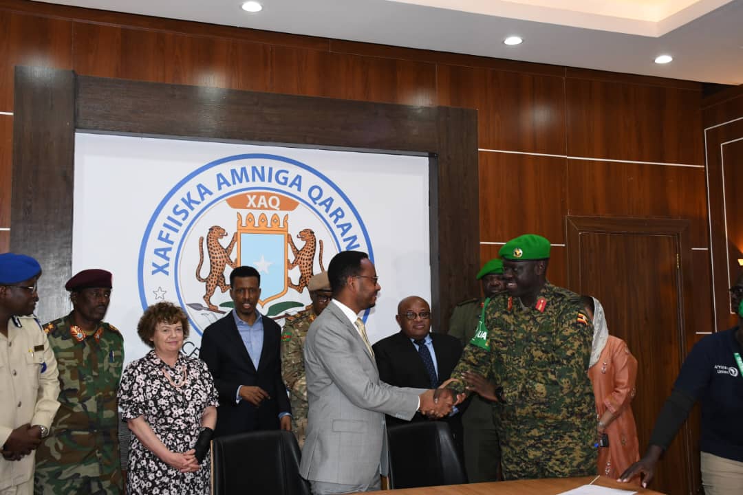 updf hands over security of vital sites to somali forces