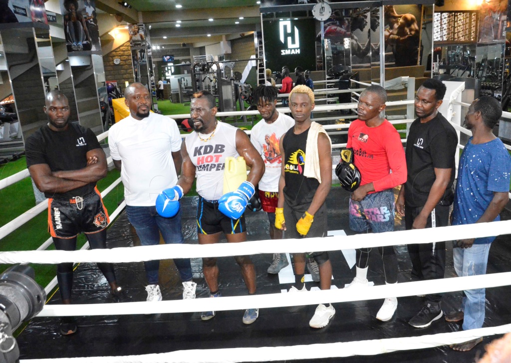 Golola vs Umar Semata Trilogy Confirmed at Nakivubo Stadium 001 - Golola is joined by Yasin Kiggundu (second left) brother to Ham during his firts training at Ham fitness and boxing gym located at Nakivubo stadium as his boxers looks on