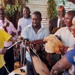 MINISTER OGWANG BEING GIFTED WITH GOODS BY KAZI NI KAZI DEFECTORS