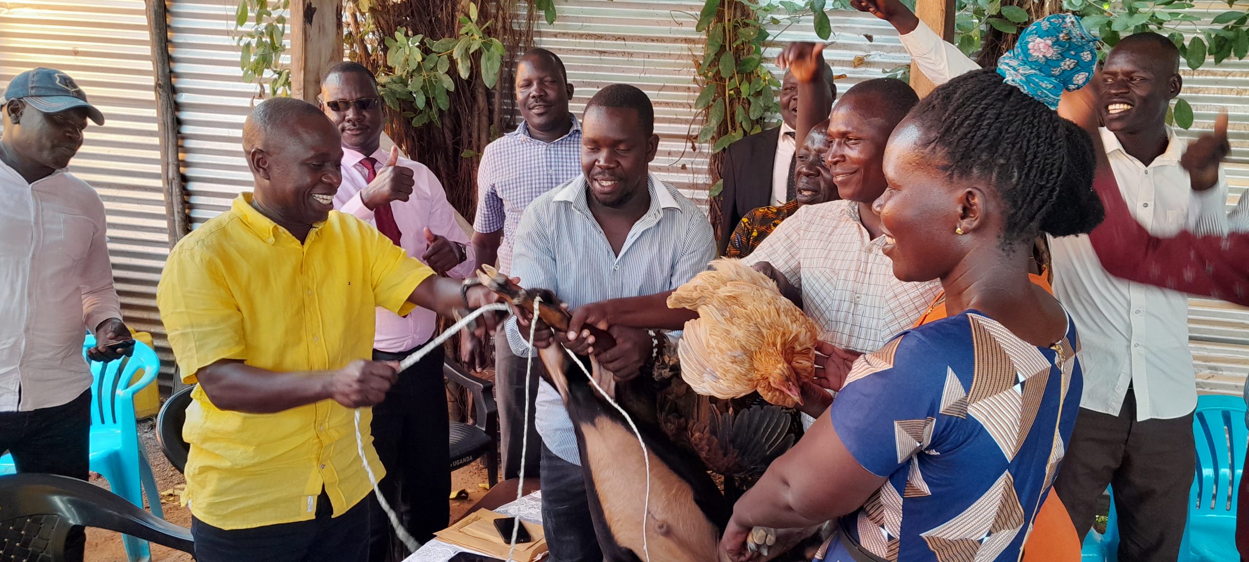 MINISTER OGWANG BEING GIFTED WITH GOODS BY KAZI NI KAZI DEFECTORS
