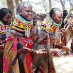 The Turkana girls in Kenya presenting a peace song during the cross boder meeting between the karimojong of Uganda and them (photo by Steven Ariong)