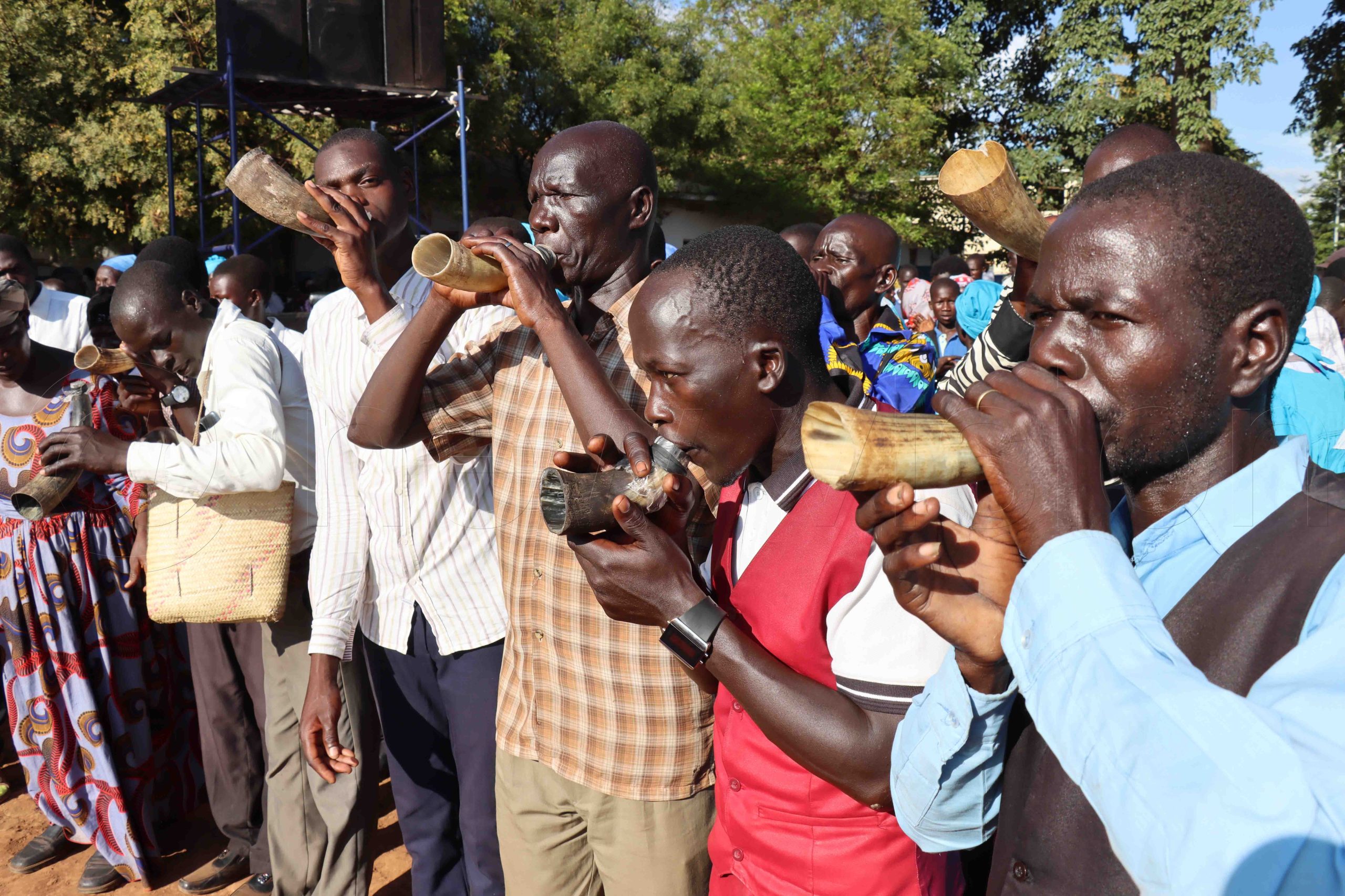 Believers playing musical instruments during crusade at Mayors Garden