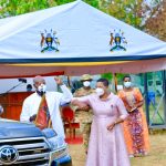 Among Museveni Fist Bump