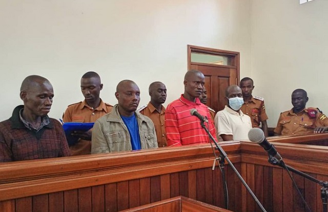 The suspected murderers of Joan Kagezi standing in the Court Dock.