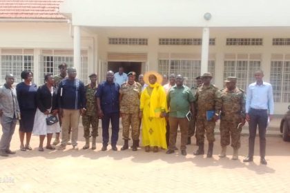 Amuru Deputy RDC Proscovia Acham in yellow Attire and other security committee in a group photo on Friday.