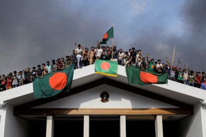 Prime Minister Sheikh Hasina, who had been steering the ship of state through stormy seas, suddenly decided to bail out of her sinking vessel. Yes, she fled the country, and as she made her dramatic exit, Dhaka turned into a chaotic carnival of revolutionaries raiding her palace like it was a massive yard sale.