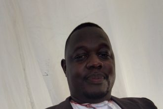 PHOTO - Mityana Municipal Council Mayor Faustino Mukambwe Lukonge -- In fear for his safety, Lukonge handed over UGX 900,000 through a window. The robbers also asked for his phone, which he gave them before they fled the scene, leaving behind broken glass.