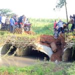 Travelers and locals are stranded after heavy rains washed away a key temporary bridge diversion along the Nagongera-Busolwe road, halting movement and sparking frustration over unfulfilled government promises.