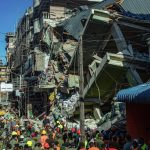 A four-story building in Dar es Salaam's Kariakoo market collapsed, leaving five dead, dozens injured, and many still trapped as rescue efforts continue.