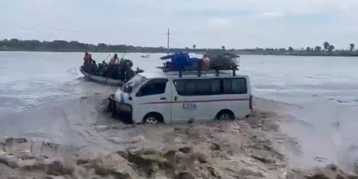 A marine engineer tragically lost his life while participating in a rescue operation after a commuter taxi was swept away by rising floodwaters from River Tangi. The incident occurred on November 27, 2024, as the river swelled and cut off the Olwiyo-Pakwach road, leaving the area in chaos.