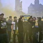 Violent clashes erupted in Amsterdam after a Europa League match between Maccabi Tel Aviv and Ajax, leading to five Israelis hospitalized and 62 arrests, as Dutch authorities condemn the "antisemitic" violence.