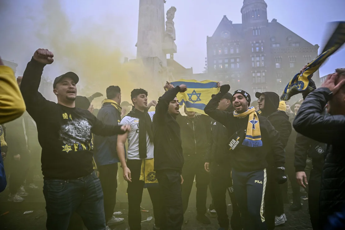 Violent clashes erupted in Amsterdam after a Europa League match between Maccabi Tel Aviv and Ajax, leading to five Israelis hospitalized and 62 arrests, as Dutch authorities condemn the "antisemitic" violence.