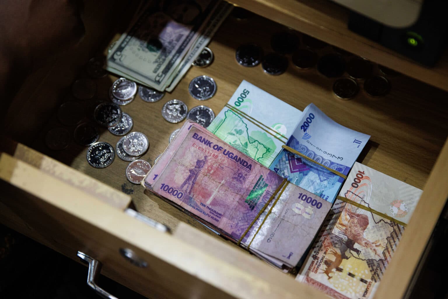 The Uganda shilling experienced a volatile session on Tuesday, weakening due to strong demand from the energy sector before partially recovering, with money markets showing tight liquidity.